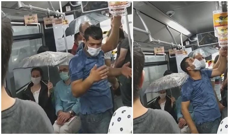 Metrobüs içinde şemsiyeyle korundular