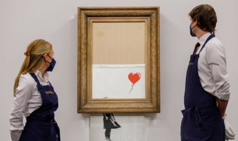 Banksy'nin müzayede sonunda 'parçalanan' eseri 16 milyon sterline satıldı