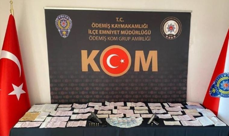 İzmir'de tefecilik yaptığı şüphesiyle 2 kişi gözaltına alındı