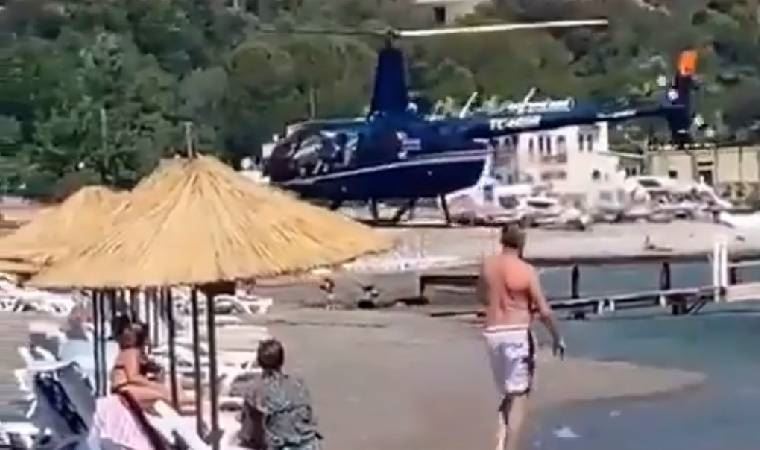 Marmaris'te helikopterin indiği plajdaki işletmeciler: Bizim için çok güzel bir anı oldu, bir tane toz bile kalkmadı