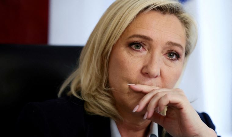 France's Le Pen strives to build on ratings boost to further detoxify her image