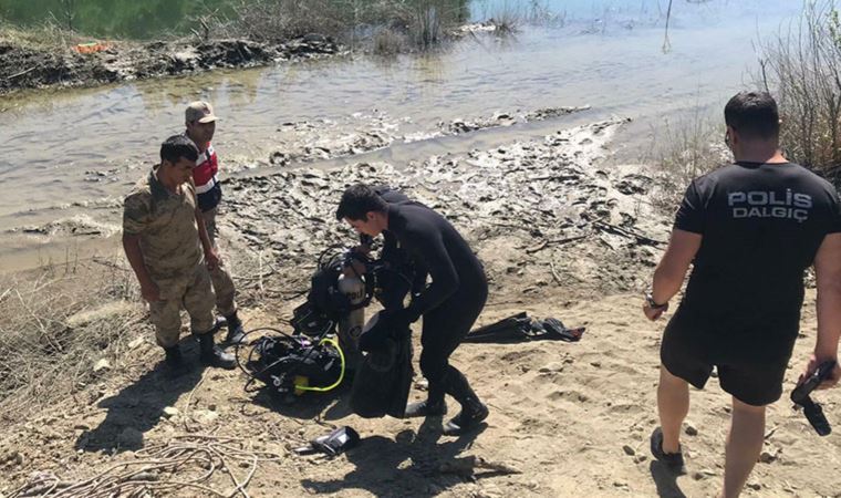 Hatay'da serinlemek için baraja giren iki kardeşten biri hayatını kaybetti