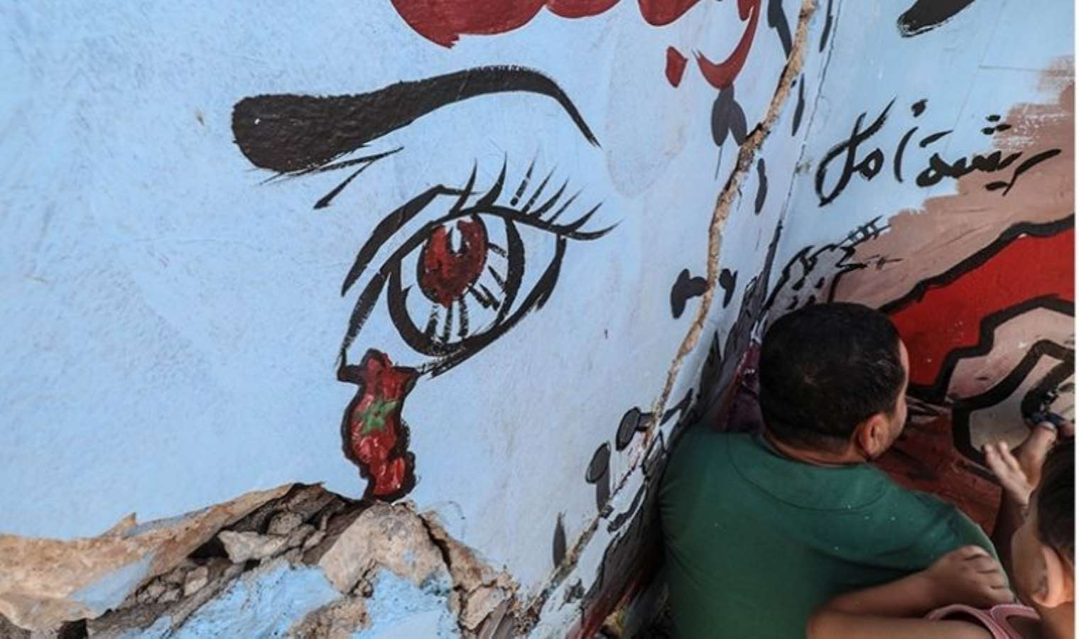 Suriyeli graffiticiden Fas'a: Acınız bizim acımız