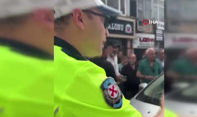 Hatalı park uyarısı alan ehliyetsiz sürücü aracını polisin üzerine sürdü