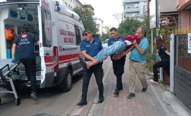 Sinir krizi geçirdi, kelepçelenerek ambulansa taşındı