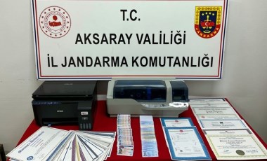 32 suç kaydı var... 'Sahte kimlik' basarken suçüstü yakalandı