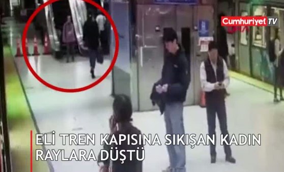 Eli tren kapısına sıkışan kadın raylara düştü