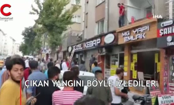 Çıkan yangını meraklı gözlerle izlediler