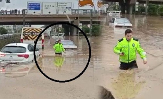 Yurttaşların imdadına beline kadar suya giren polis yetişti